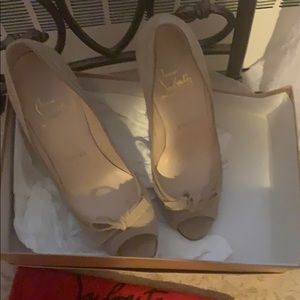 Louboutin peep toes